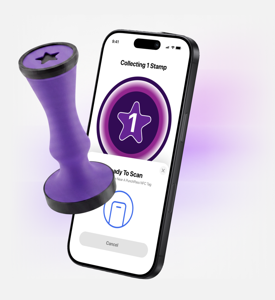The PunchPass stamper and a phone showing the loyalty card